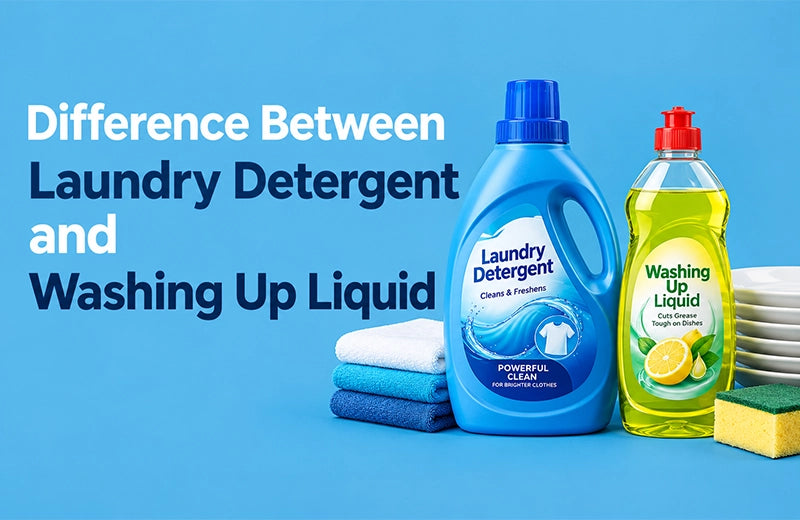 Blue bottle of laundry detergent next to a green bottle of washing up liquid with towels, plates and a sponge